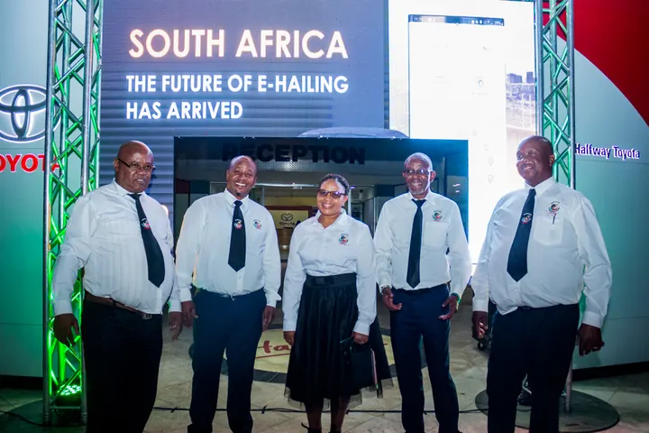 Guests in front of the launch screen at Halfway Toyota Fourways