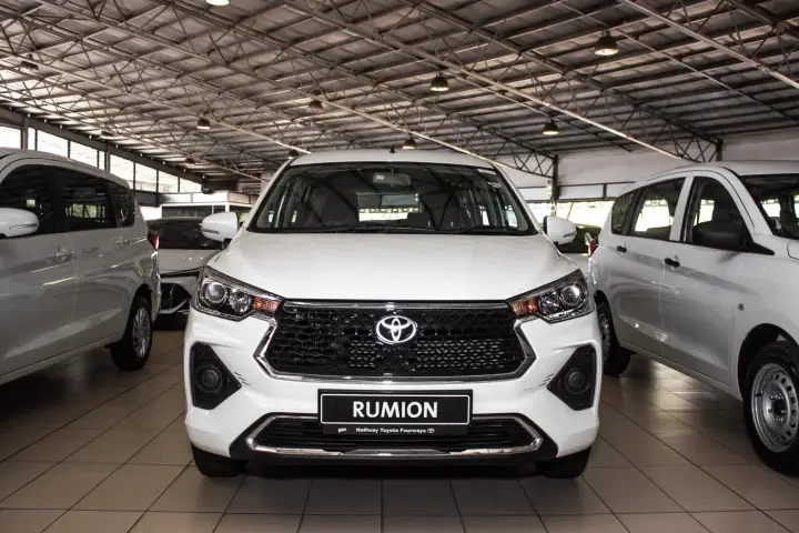 A white Teksi fleet vehicle