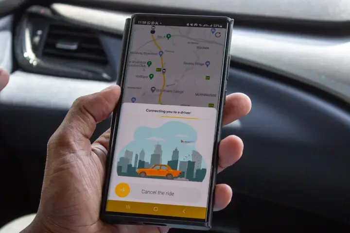 The Teksi Ride app showing a live map on a phone