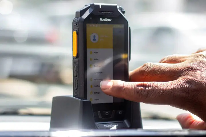 Teksi dispatch device mounted in a car